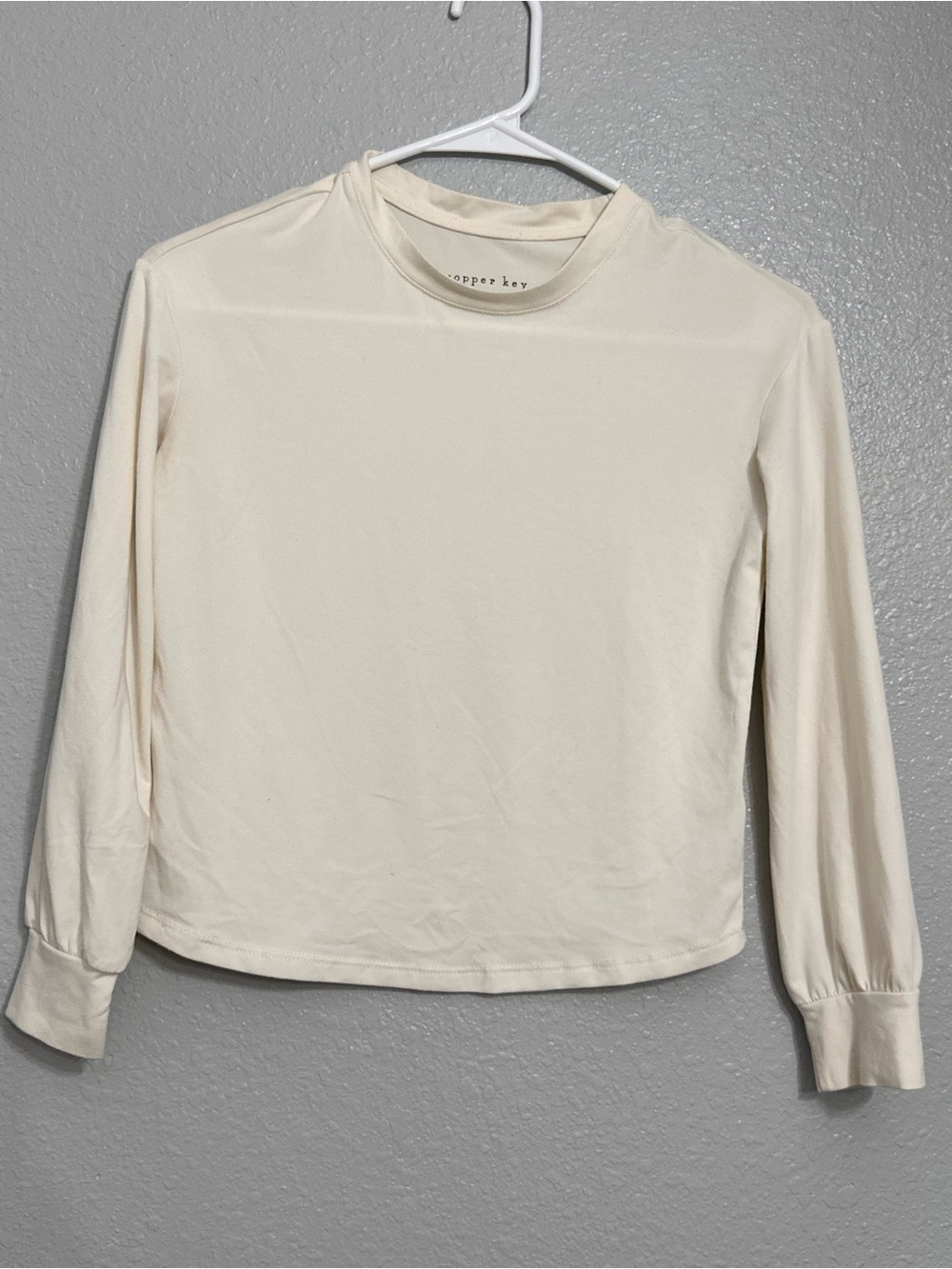 Copper Key Cream Long-Sleeve Crewneck Top